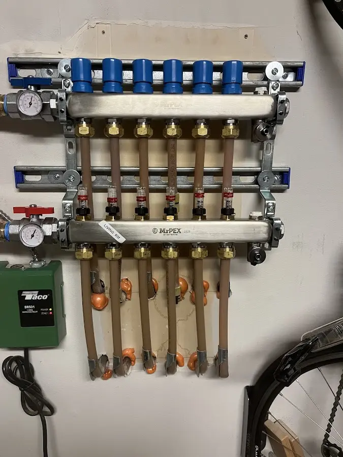 Plumber performing Gas Line Installation at a residential property in Tipton